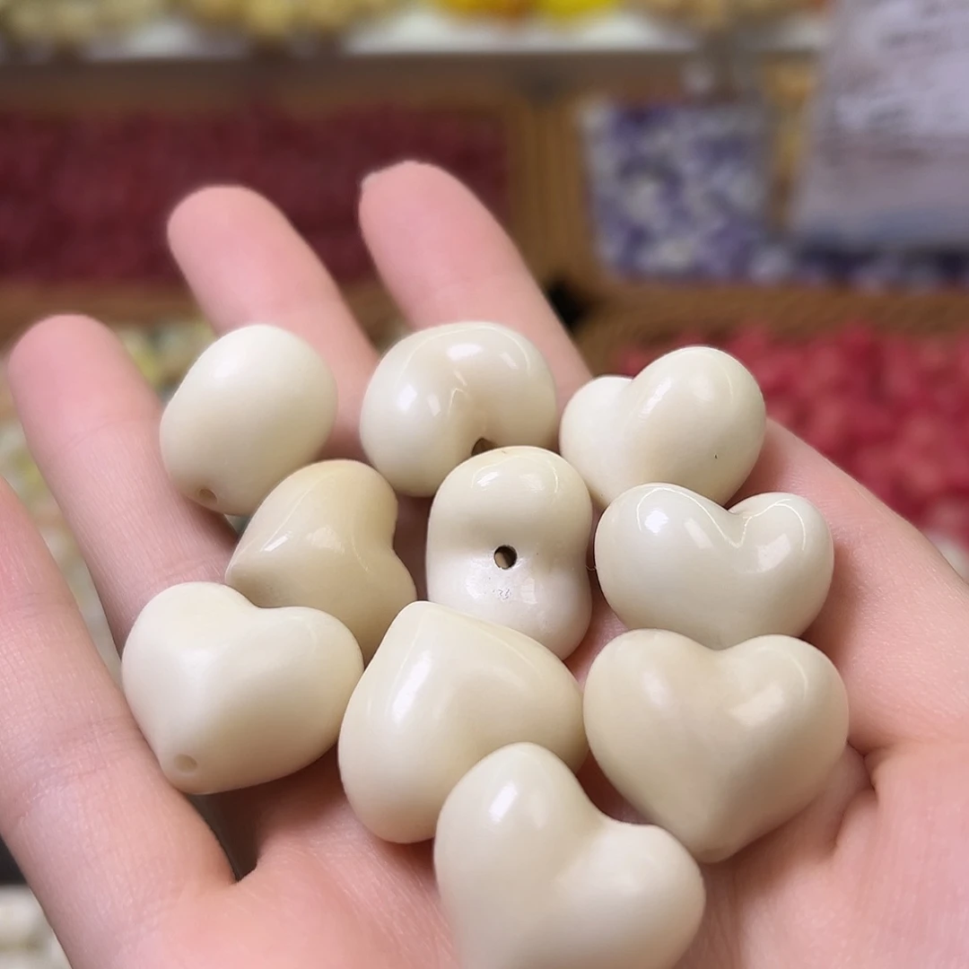 菩提根/象牙果手串瑕疵白爱心6颗