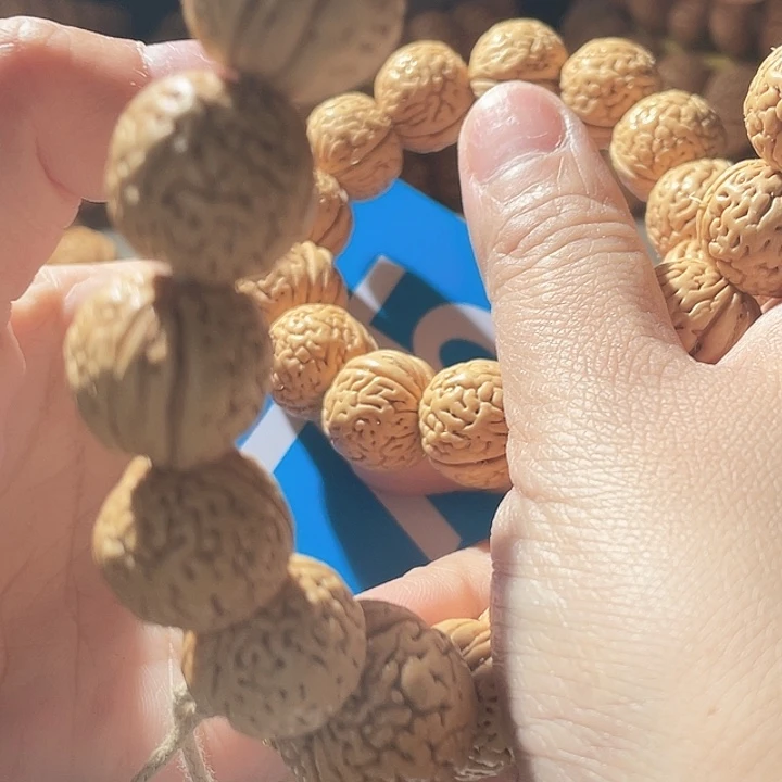 佳****桃核吊坠桃核手串绣球75