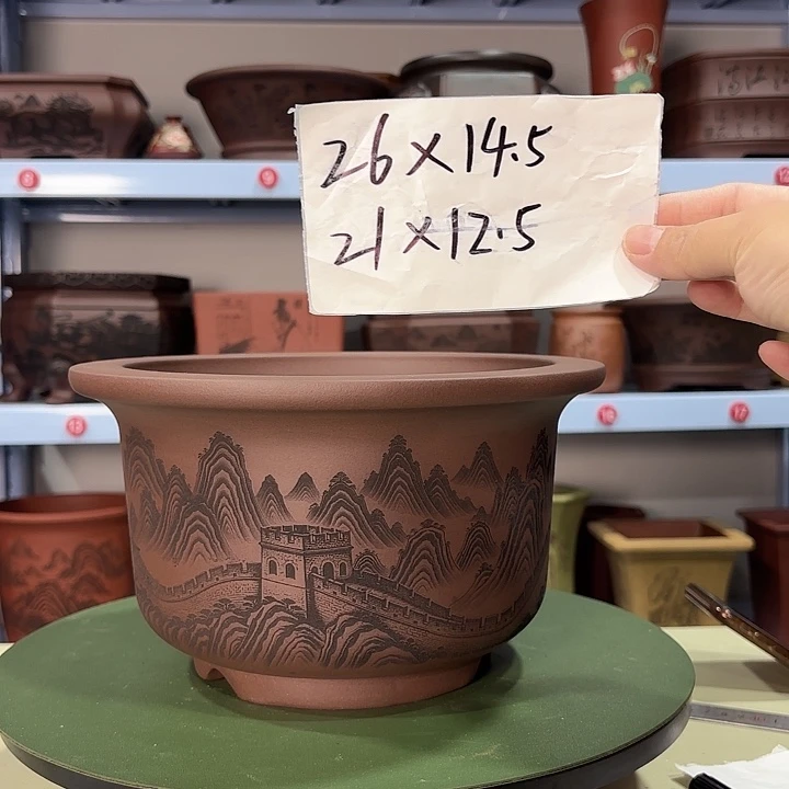 紫砂花盆刻绘万里长城