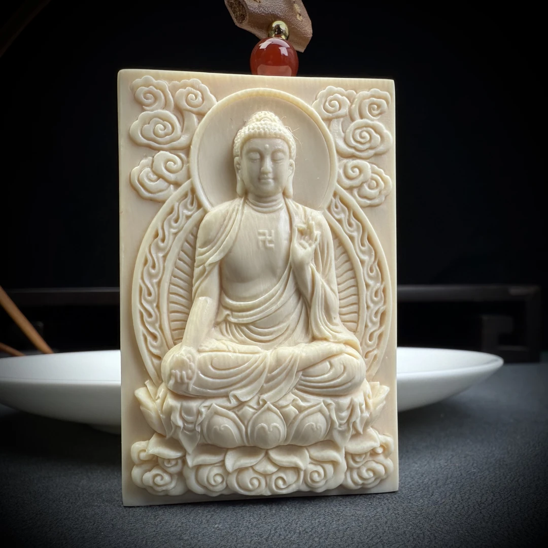 K9302天然猛犸牙 大日如来 44*65*20mm支持鉴定 假一罚四