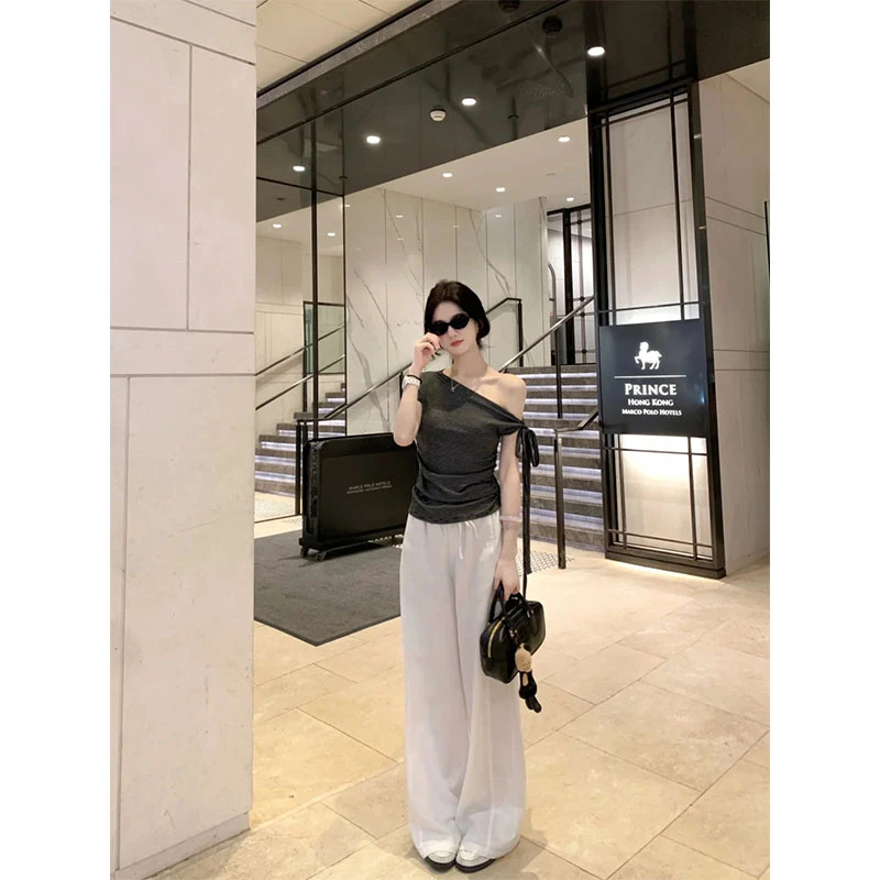 韩系气质休闲百搭时尚洋气设计感斜肩条纹短袖上衣高腰直筒裤套装