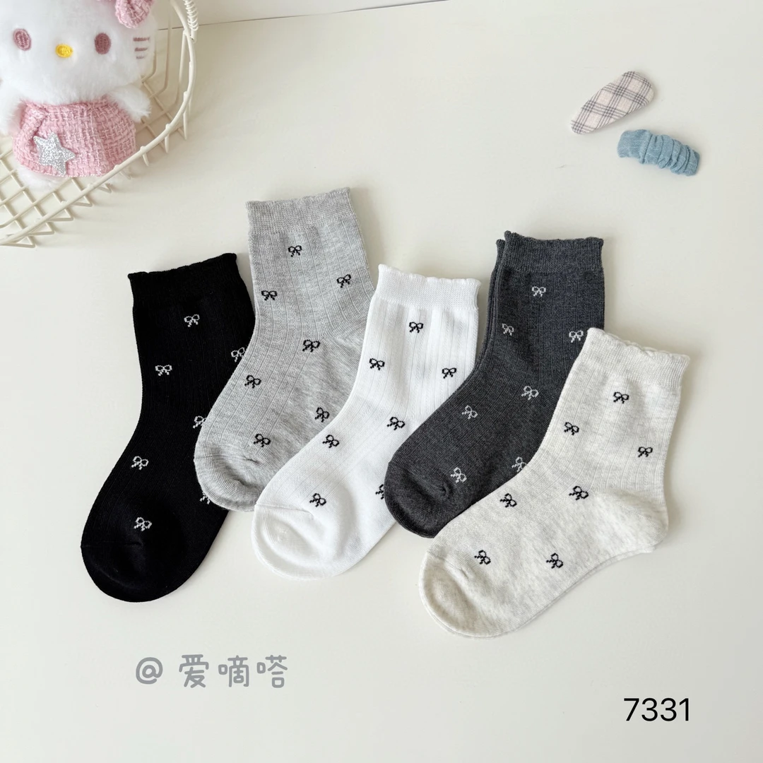 爱嘀嗒7331儿童袜子春秋季新款公主风黑白蝴蝶结女童中筒精梳棉袜