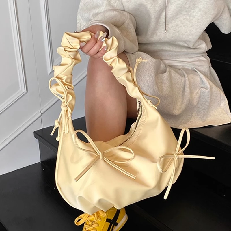 大容量包包女夏季2025新款小众设计褶皱单肩斜挎包休闲通勤饺子包