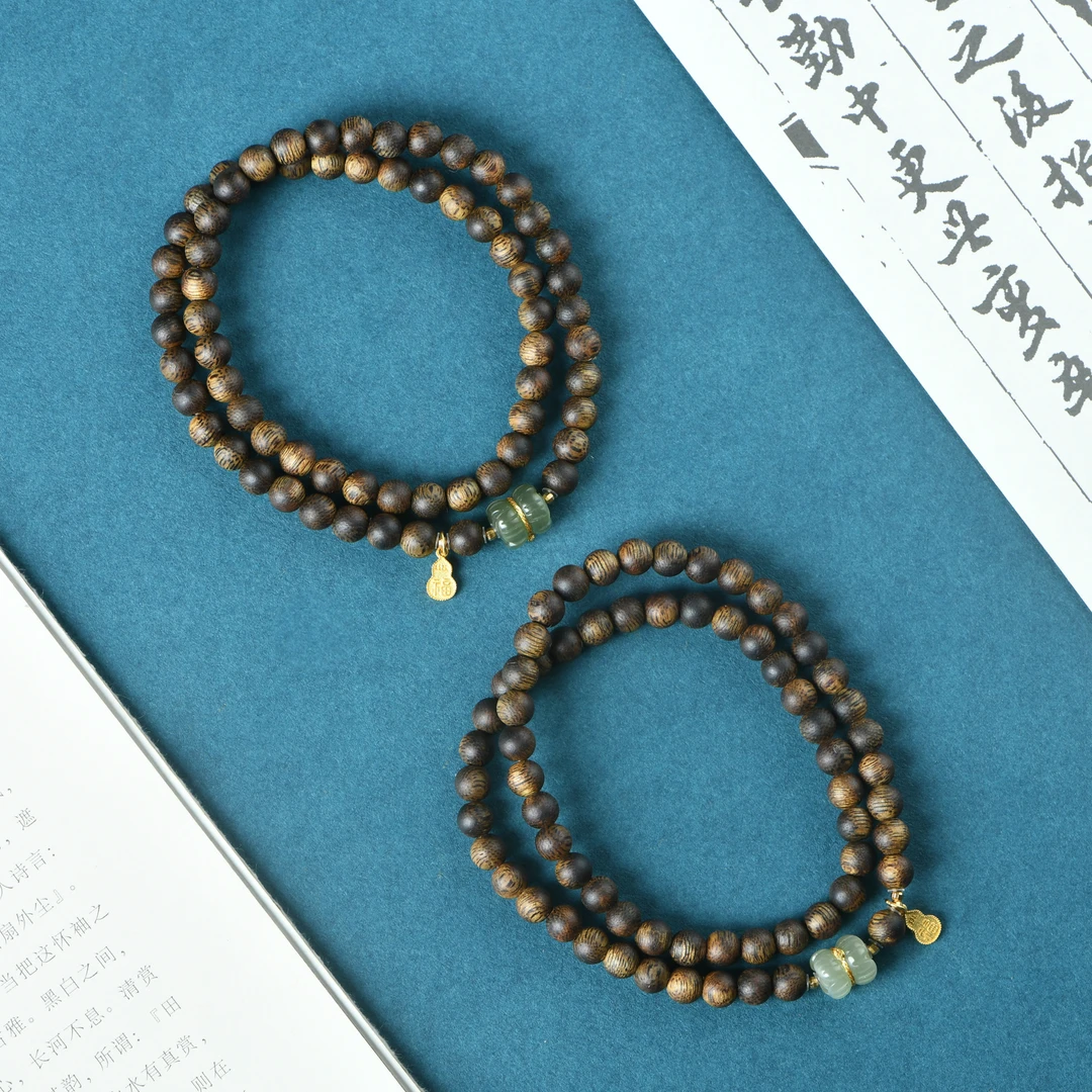 沉香海南莺歌绿奇楠沉香0.5双圈手链和田玉并蒂莲款（多样性发其一