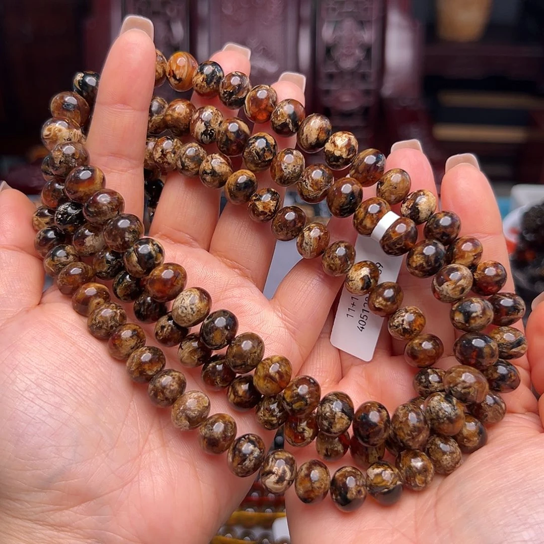 琥珀裸石未镶嵌黑***者抚顺琥珀20554。11m m