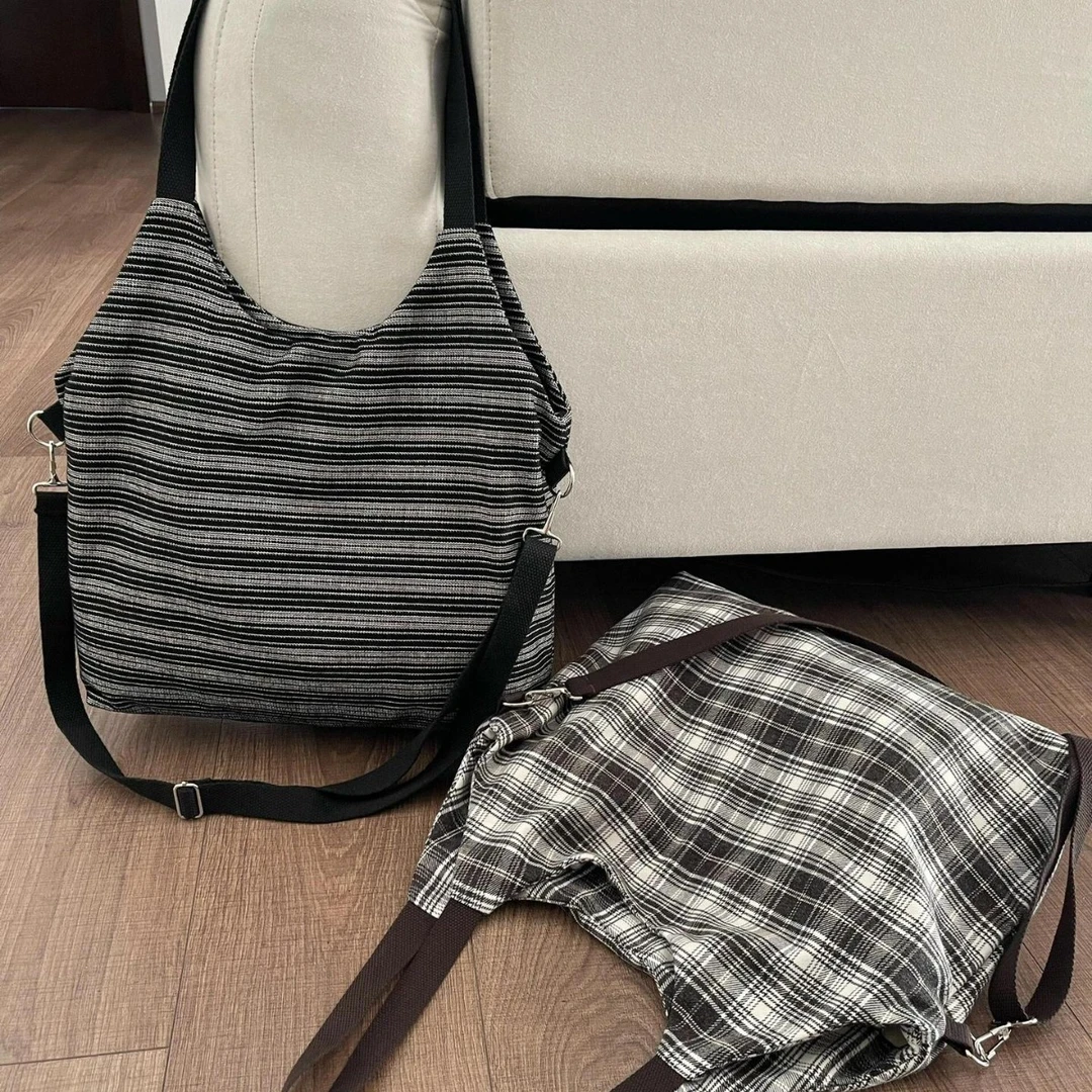 2025新款时尚帆布包复古黑色条纹单肩包大容量休闲百搭上课通勤包