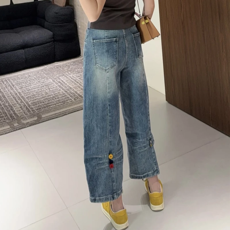 萱贝纯设计感显瘦直筒裤女2025早秋新款时尚JJ米奇扣子八分牛仔裤
