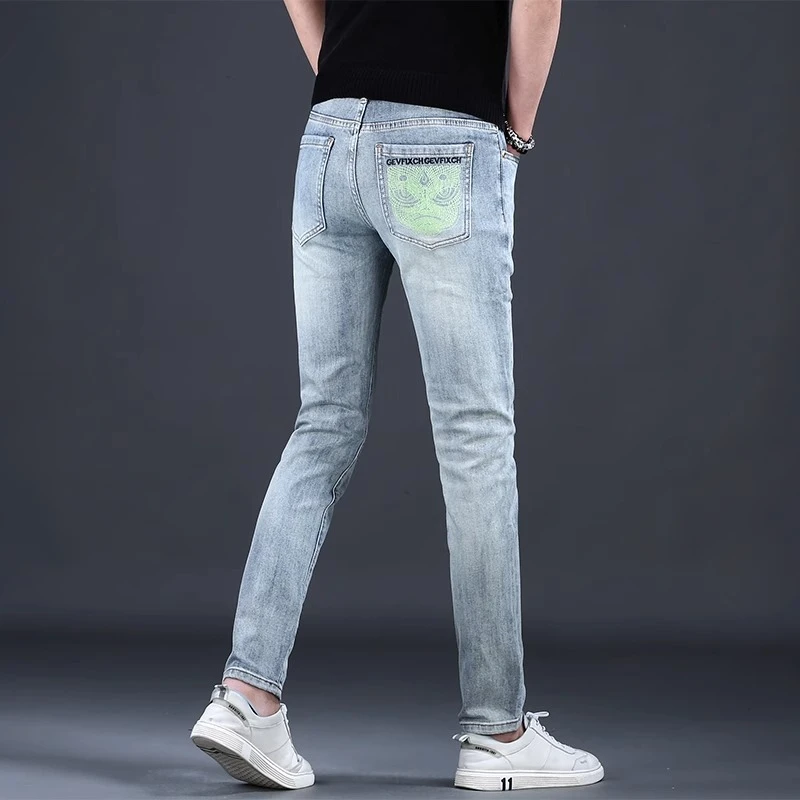 JJ高端春夏季新款刺绣潮牌牛仔裤男士男款修身小脚弹力休闲百搭裤