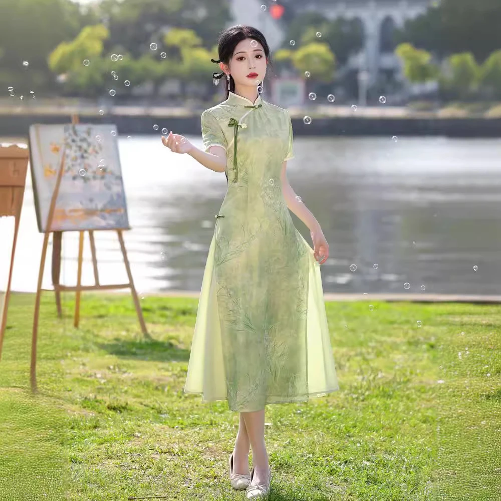 绿色奥黛旗袍2025新款夏季改良年轻款少女新中式日常可穿高考送考