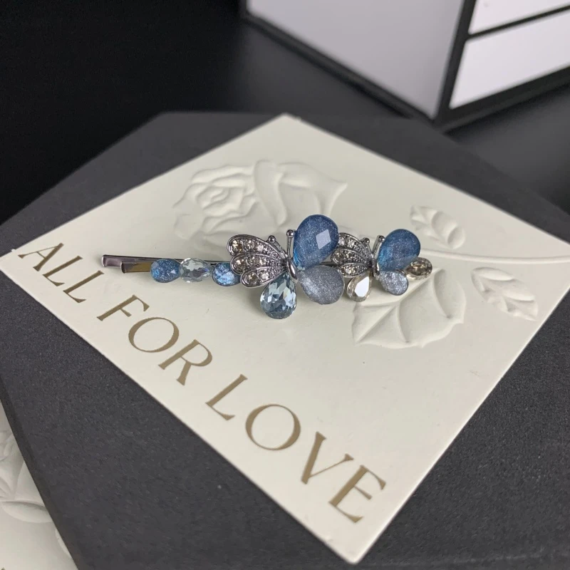 K838【金闪闪】5.5厘米蓝色立体蝴蝶一字夹