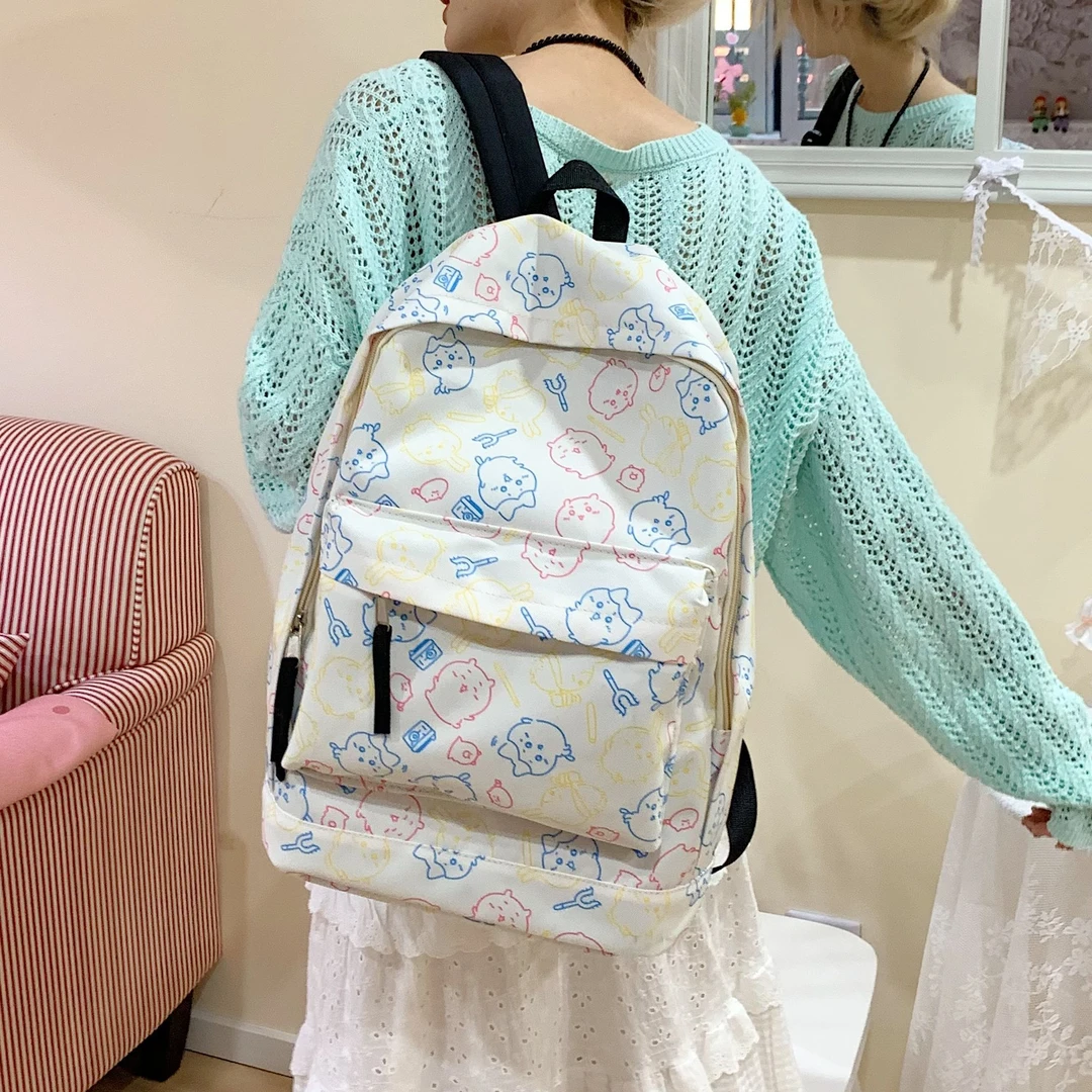 涂鸦卡通初中生书包女生轻便ins可爱大容量背包大学生双肩包旅游