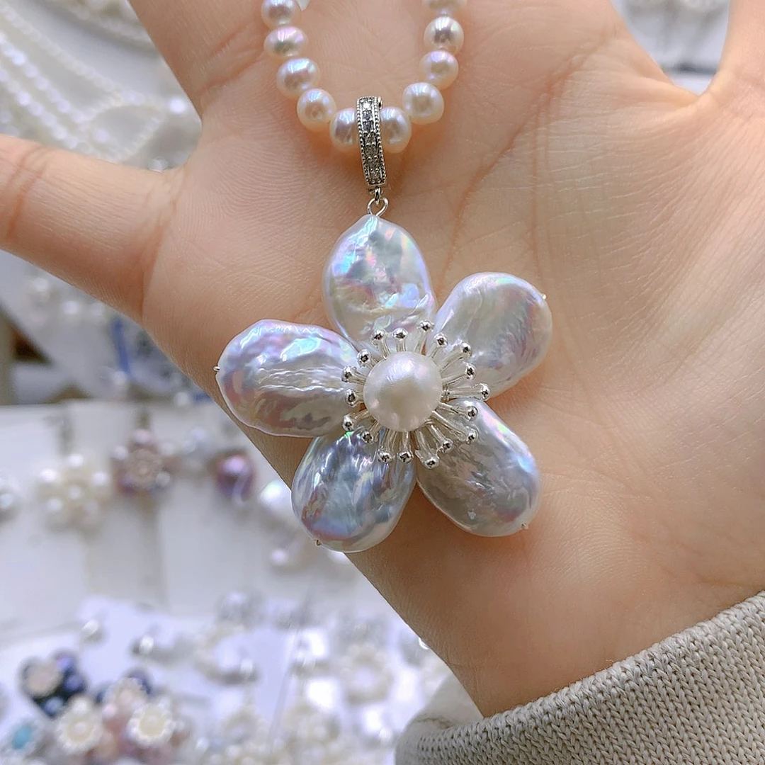 银S925镶嵌耳饰淡水珍珠丸**马