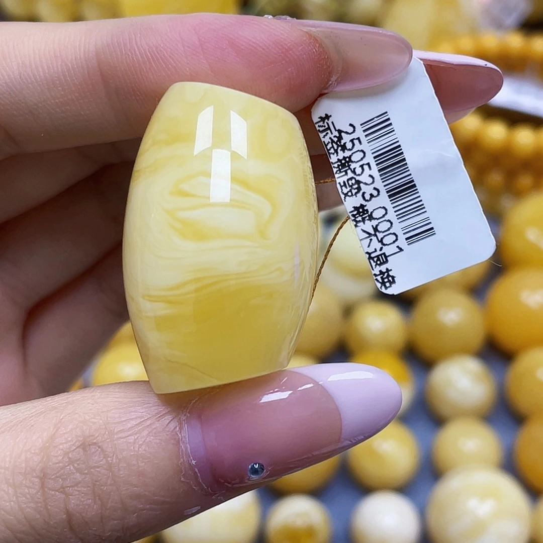 匪****蜜蜡未镶嵌裸石34.9*20.7mm.瑕