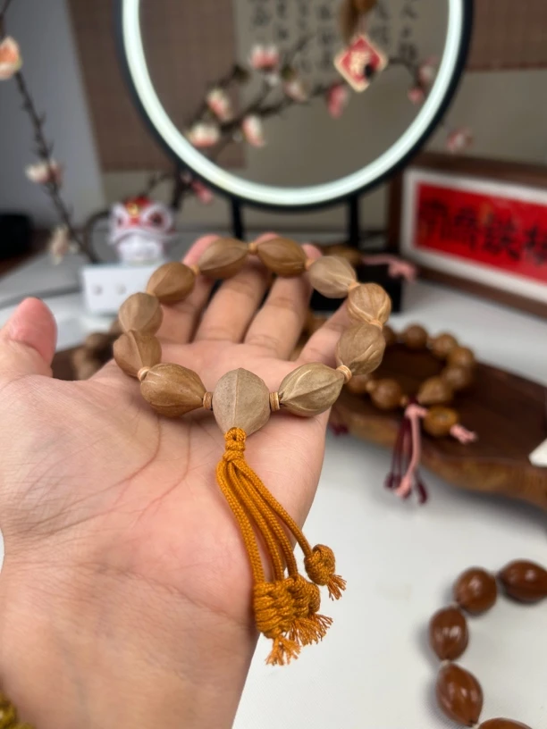 梅林铁核15×24三面佛橄榄核素串