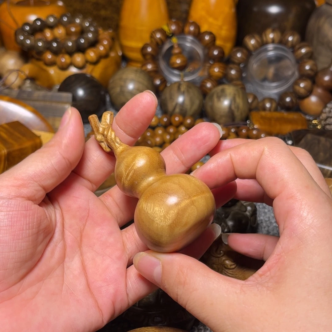 新***育金丝楠葫芦手把玩