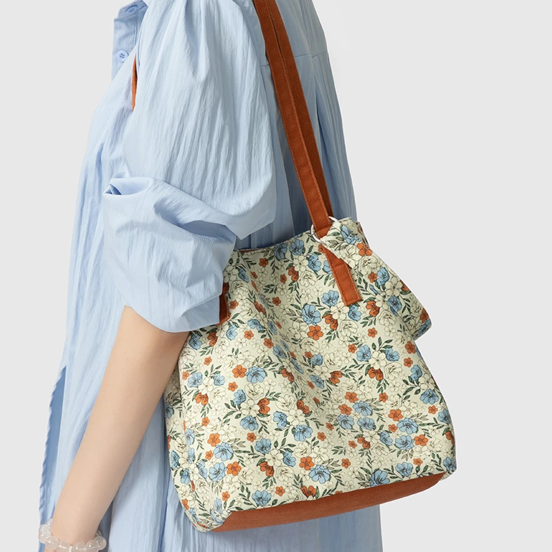 尼睿x颜二两 插画师合作款百搭花花单肩斜挎包女百搭手提小众包包