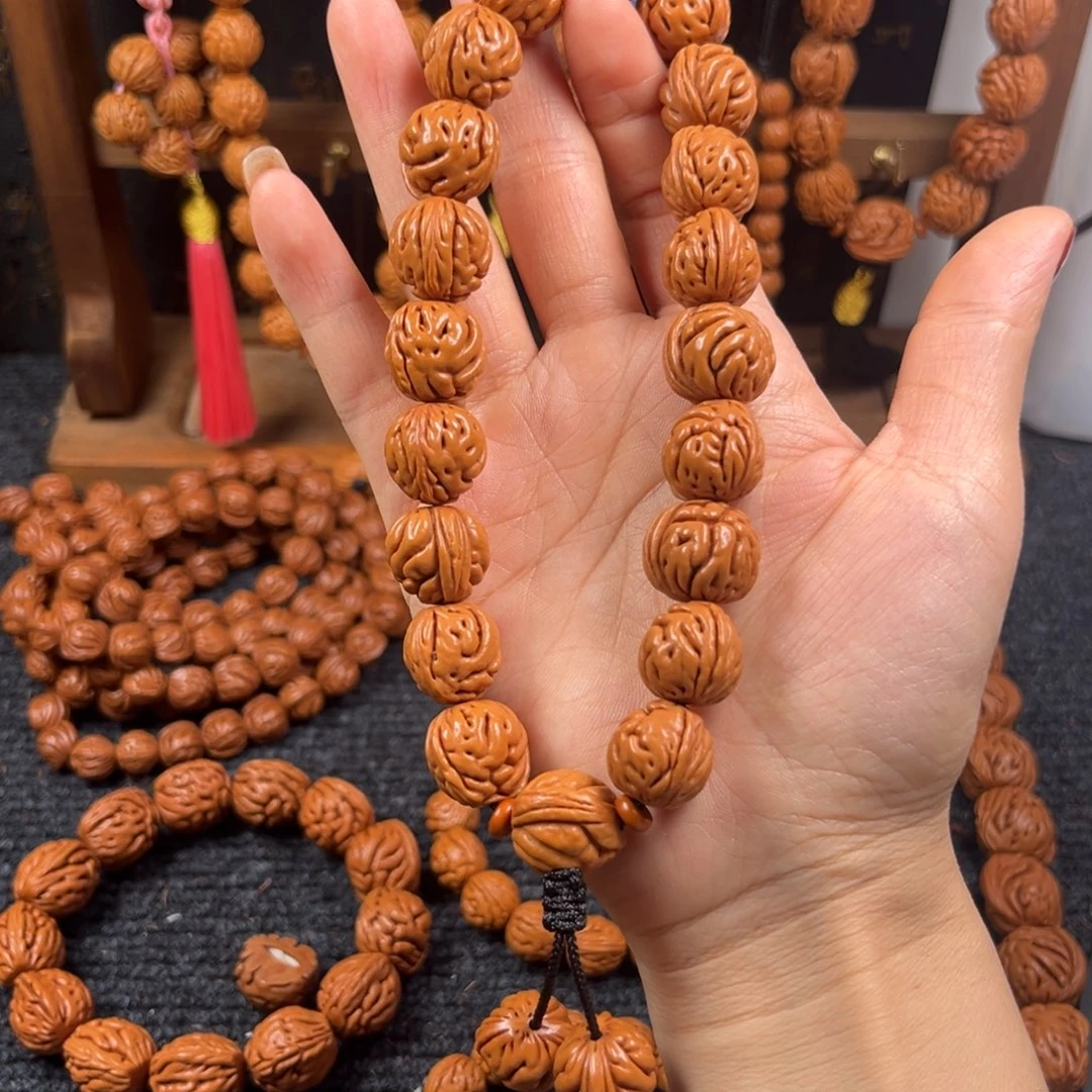 吊坠桃核桃枭手持L4