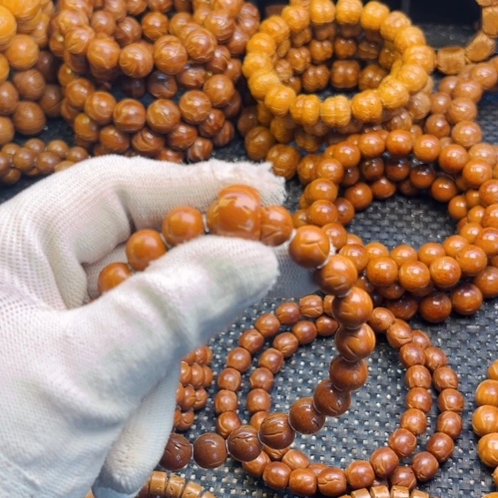 桃核手串李****s过11尺龙纹跑环