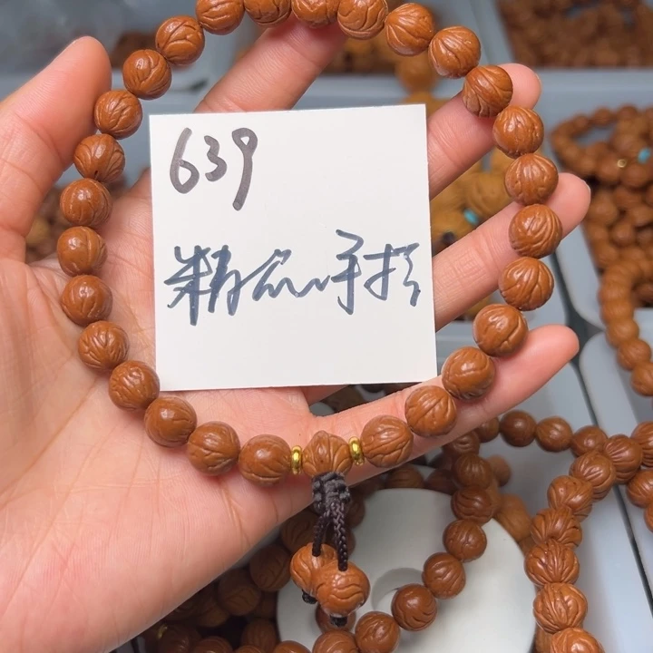 桃核把件简**乐秦岭野生龙纹桃核玉龙脊