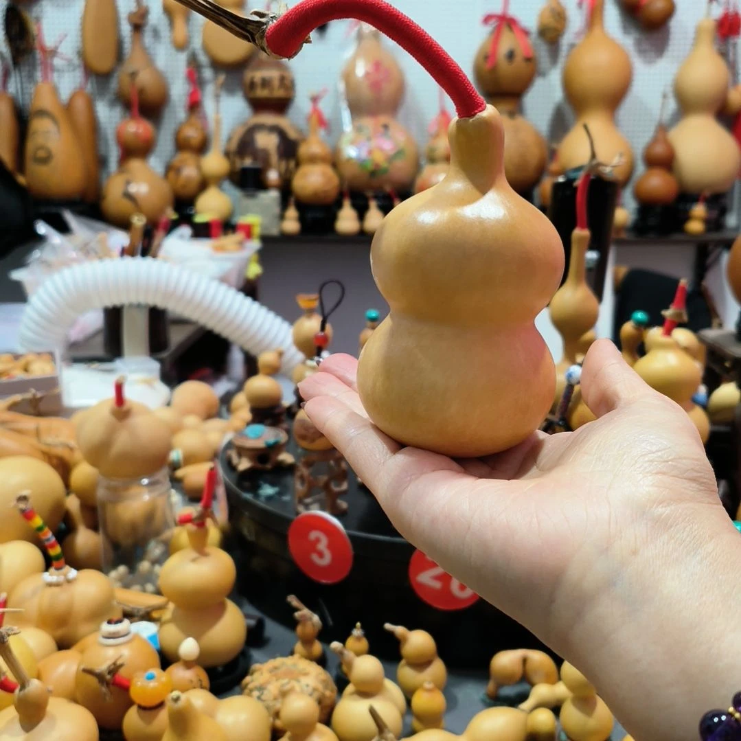 飞****。葫芦福禄双全手把件