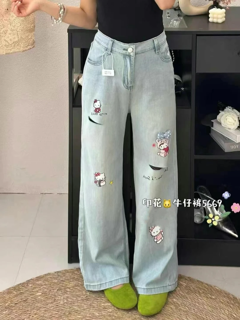 5669蝴蝶结卡通印花破洞牛仔裤胖mm大码女裤宽松高腰重工直筒裤潮