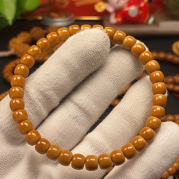 用***0橄榄核手串6.3老挝正三花核尖单圈