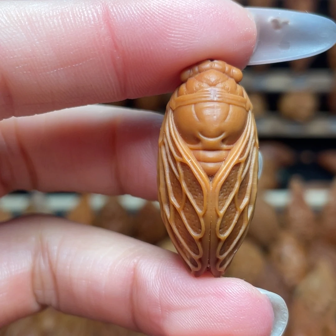 橄榄核把件一鸣惊人