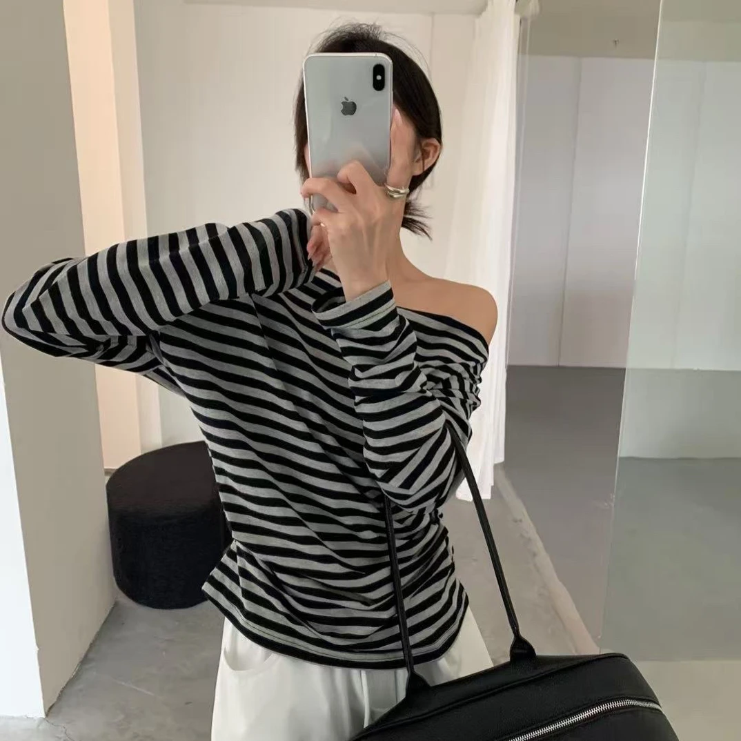 C/UZ0771 条纹一字肩斜肩宽松显瘦长袖T 9-19