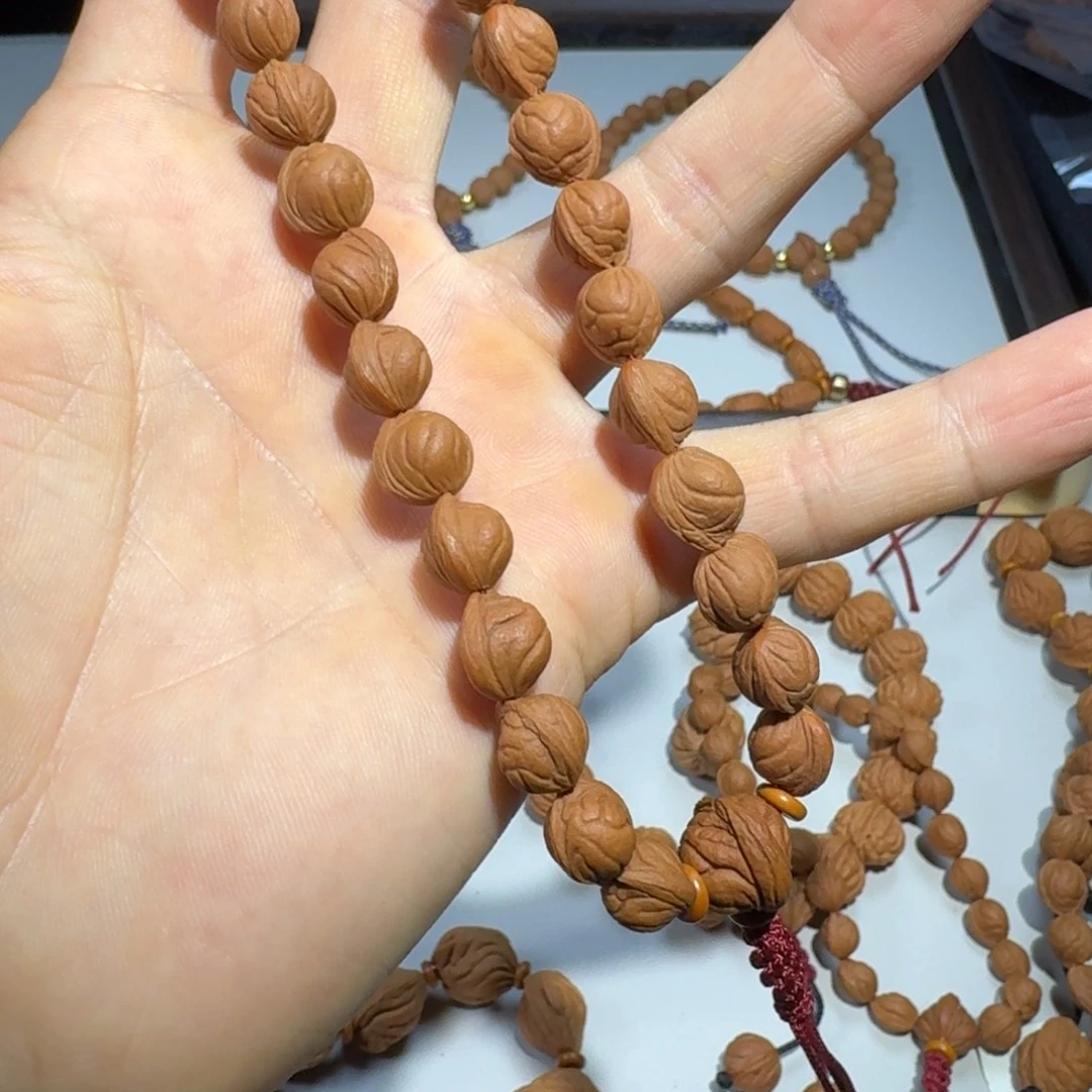 余***香桃核手串玉龙脊桃核