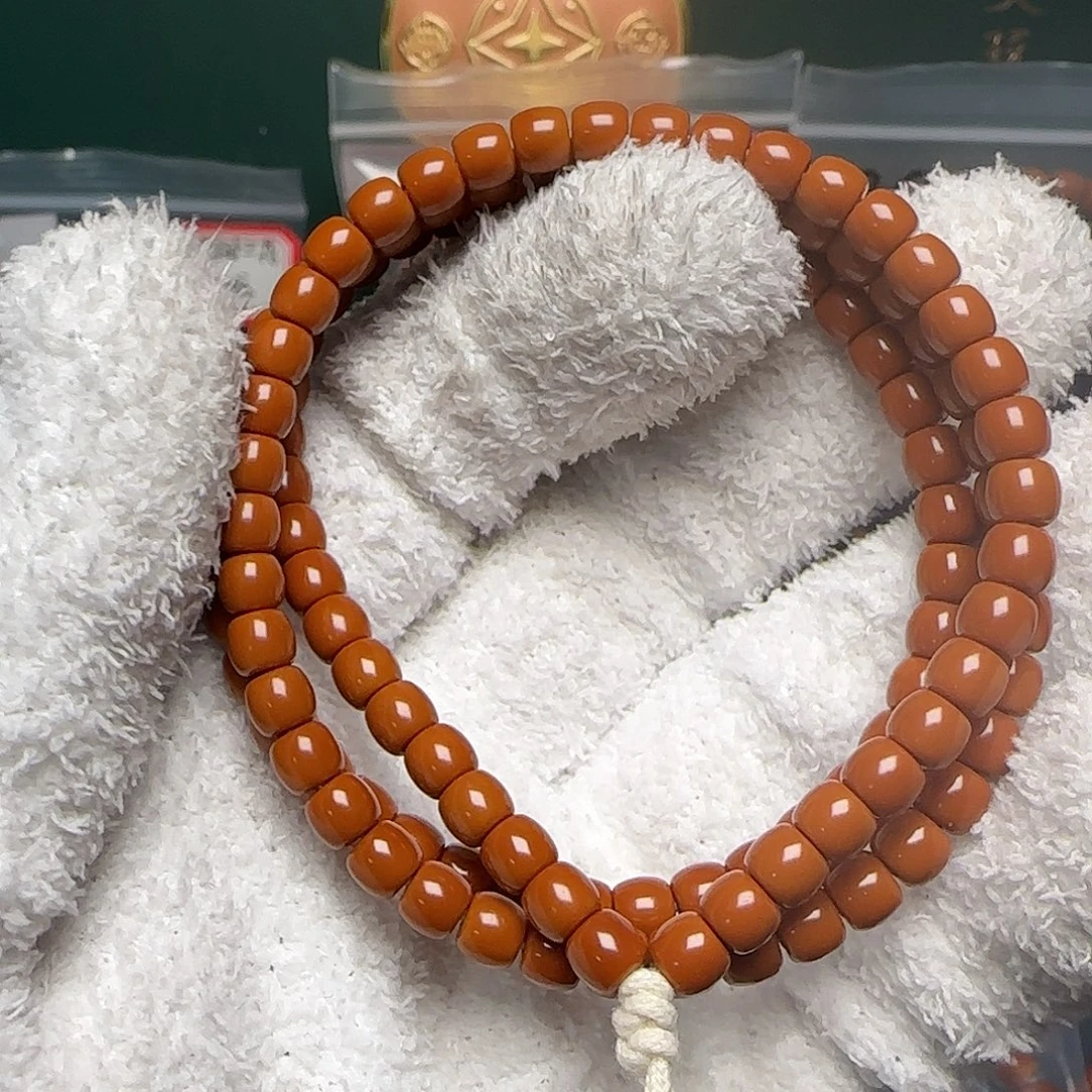 橄榄核吊坠5.6mm老挝全无白核尖长串毕业款