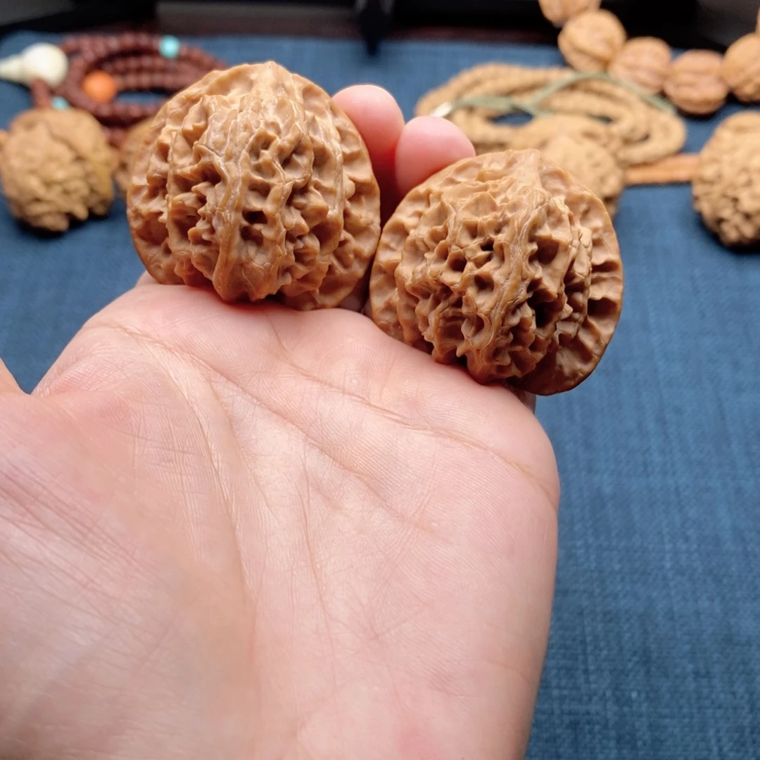 吊坠桃核苹果园狮子头41