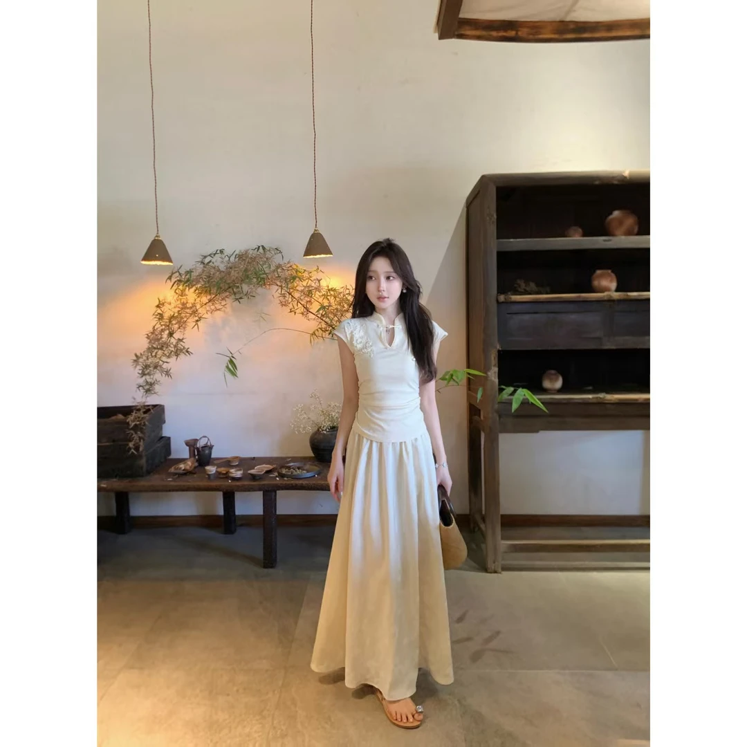 2025夏季星离雨散新中式小飞袖条纹针织上衣搭配中长款垂感半身裙