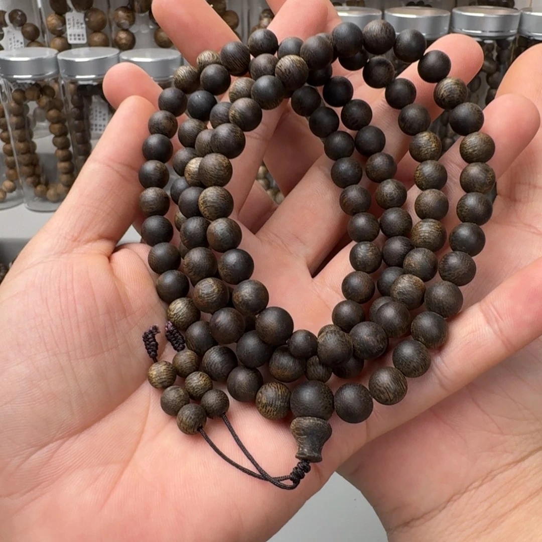 伟***默手串沉香棋楠沉香沉水张勺子卡8保38克