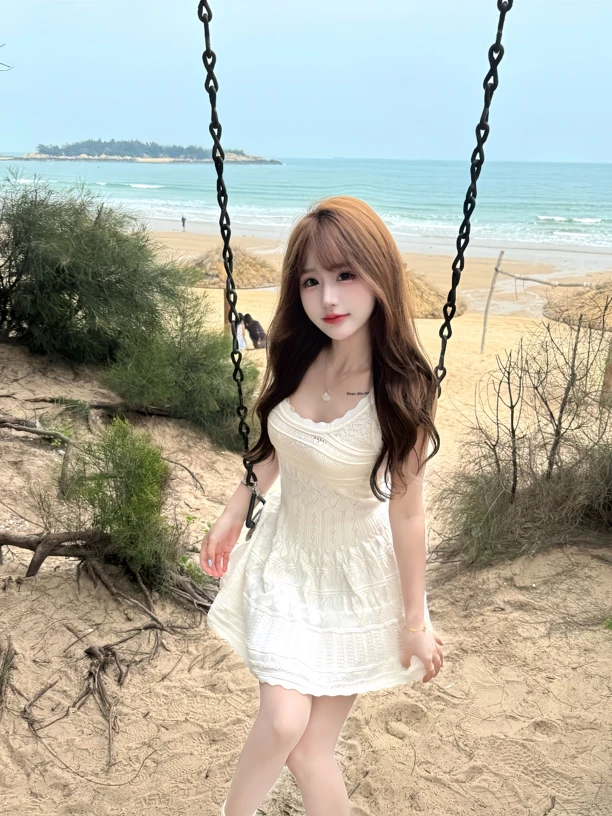 【温柔小白花镂空编织收腰蓬蓬连衣裙】