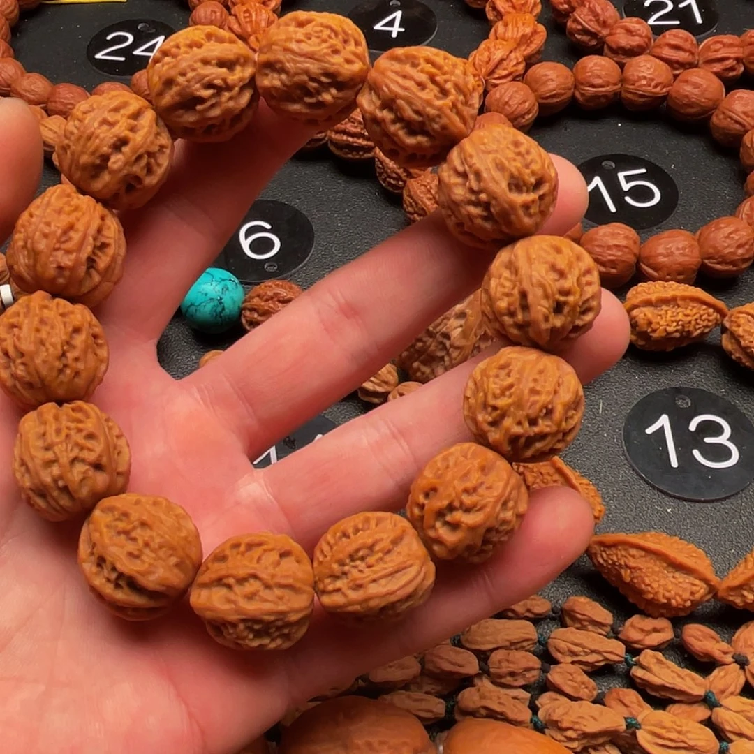 打***走文玩核桃吊坠京八