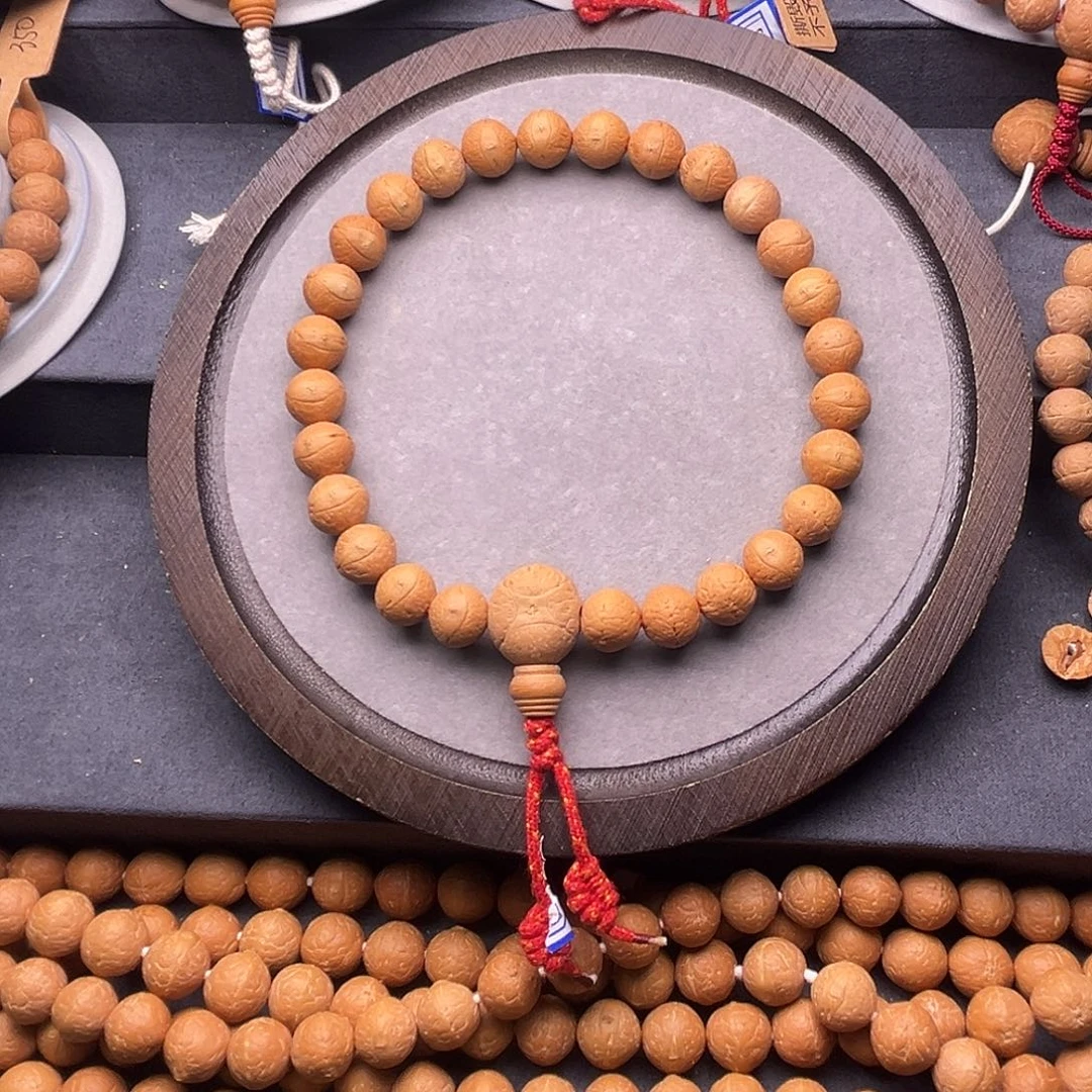 凤眼菩提手串同树籽黄皮手持