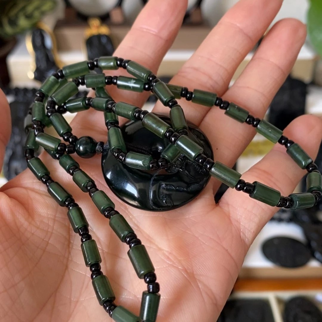 蛇纹石玉未镶嵌吊坠胖*机