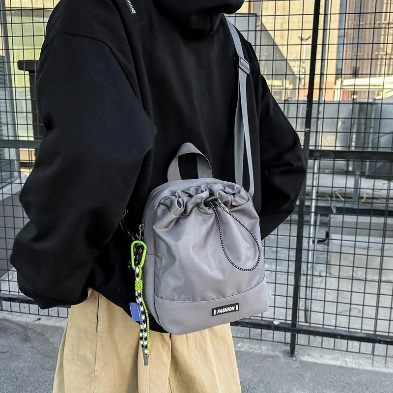 新款户外旅行多功能水壶包轻便斜挎包大容量机能手机包运动水杯包