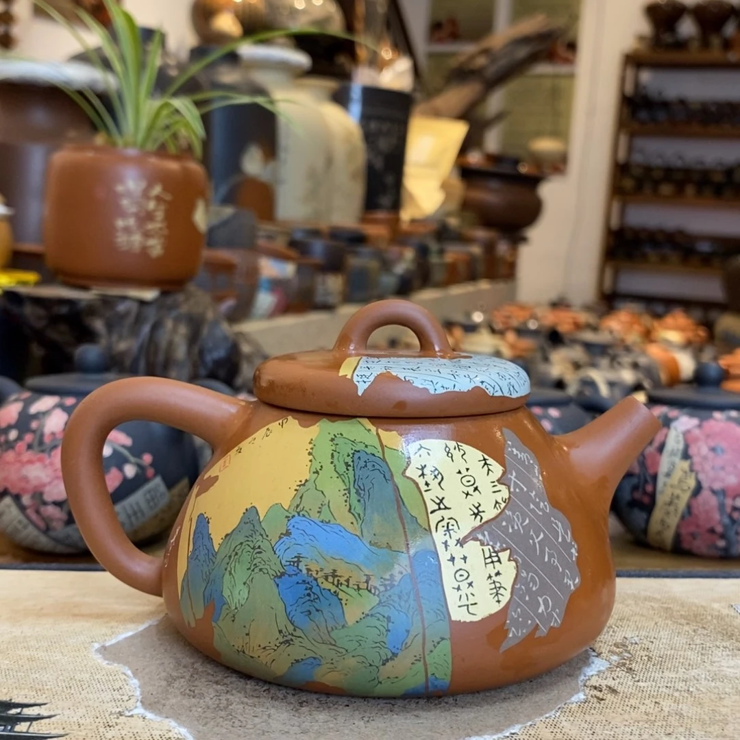 伊***闻云南建水紫陶彩填壶