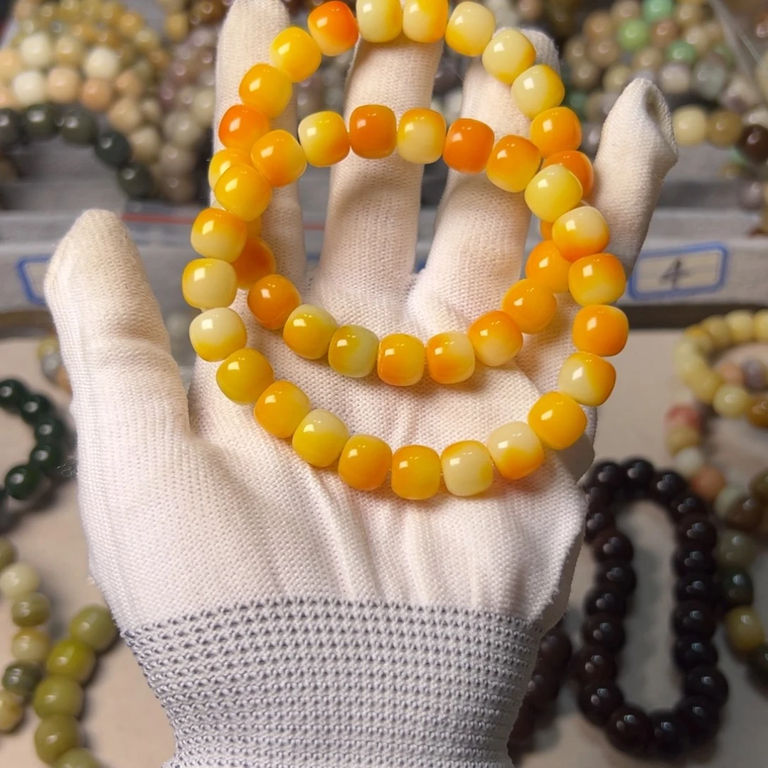 手串菩提根/象牙果橙光桶珠卡10