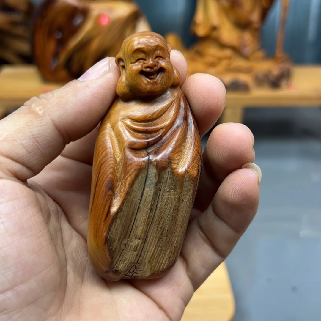 刘***军木崖柏木摆件手把件