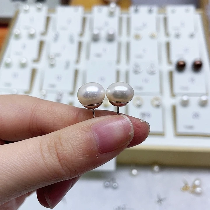 淡水珍珠耳饰银S925镶嵌格**话