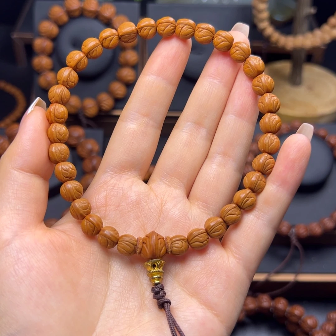 大***齐桃核手串野生玉龙脊0.8