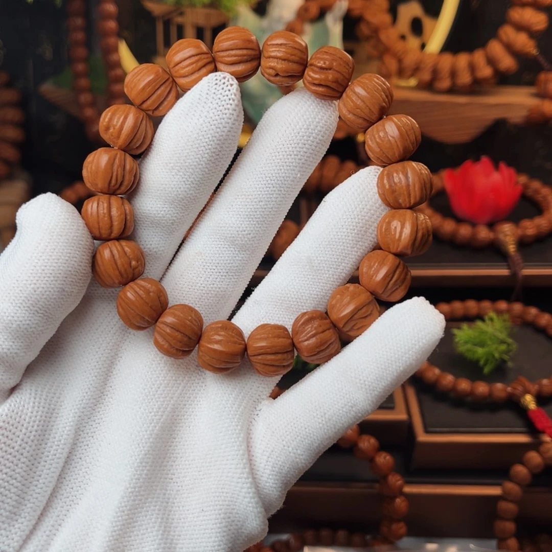 吊坠桃核14佛手手串