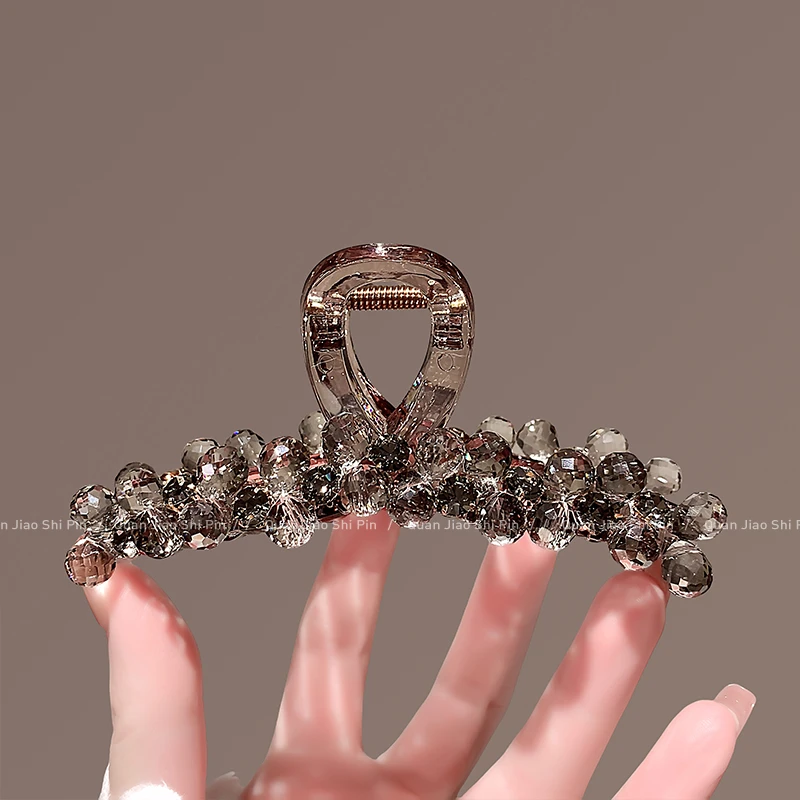 网红时尚2025高级感水晶抓夹轻奢后脑勺盘发夹高端春夏款头饰