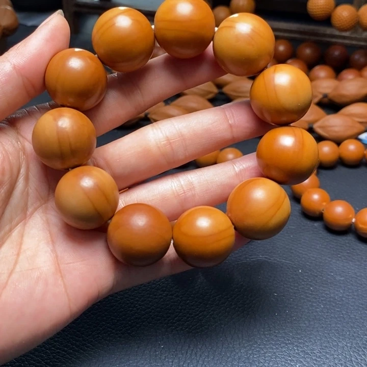 手串橄榄核2.1尺寸四花光珠全品