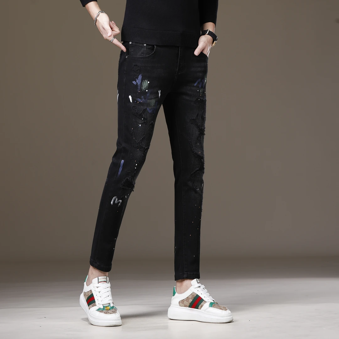 高端新款破洞黑色九分牛仔裤男秋冬厚款潮牌嘻哈泼墨修身小脚裤子