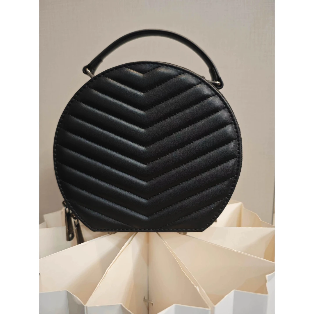TOLEX2025新款手工时尚百搭圆饼女包白红黑色