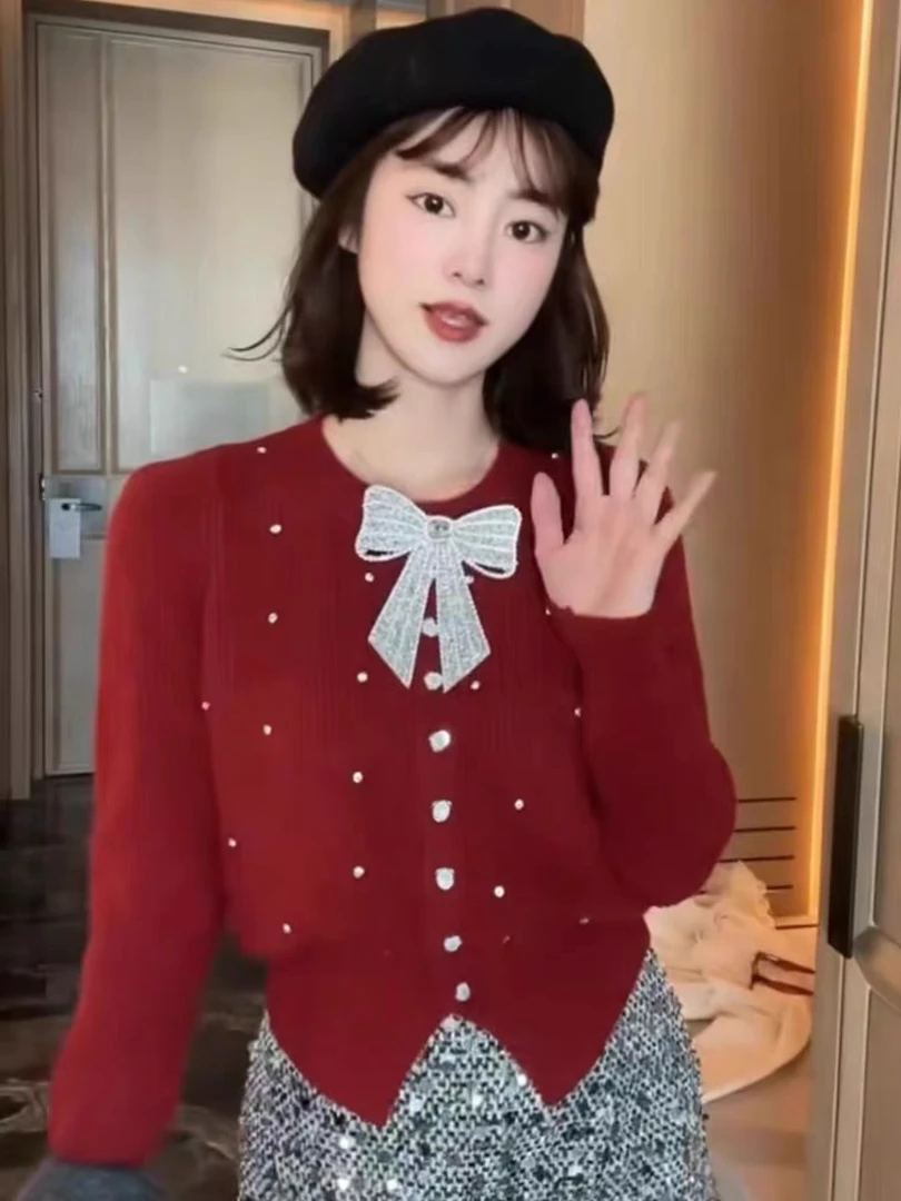 1233亮片蝴蝶结设计感修身显瘦圆领单排扣针织开衫