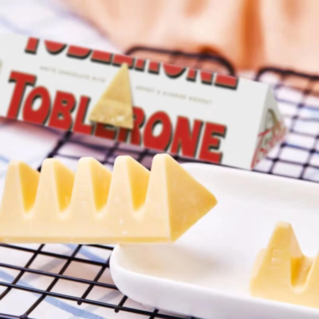 【至25-2-24】瑞士三角白巧克力制品含蜂蜜及巴旦木糖100g*2条